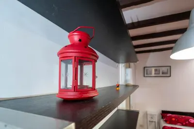 a red lantern sitting on top of a kitchen counter at Apartment Gaia in Rome