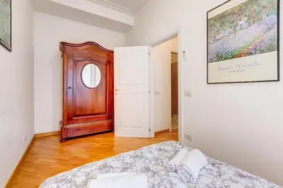 a bedroom with a bed and a window in it at Crescenzio St Peter’s House in Rome