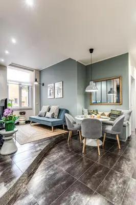 a living room with a couch and a table at Daag Corso Luxury Apartment in Rome