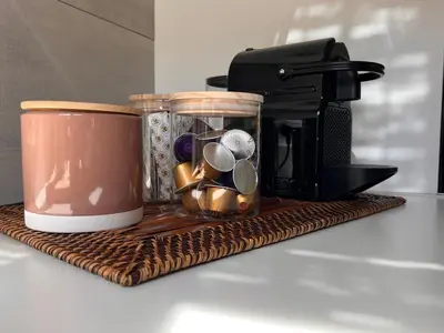 a coffee maker on a tray next to a coffee pot at Casa Fiore in Rome