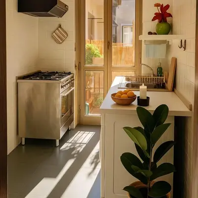 a kitchen with a sink and a stove top oven at Flaminio Luxury - GR HOME in Rome