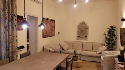 a living room with a couch and a table at casa vacanza vaticano in Rome