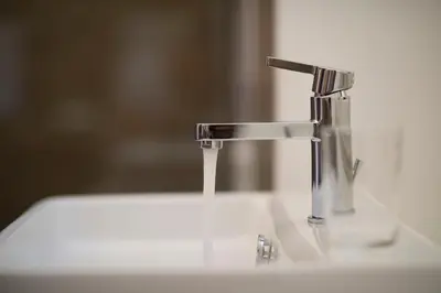 a sink with a water faucet on top of it at Suite Deal in Rome