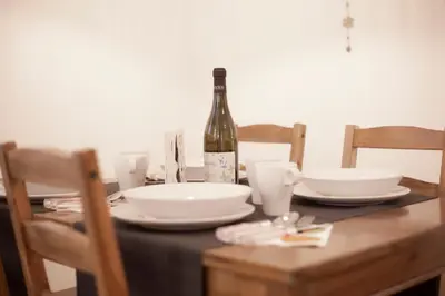 a bottle of wine sitting on top of a table at Casa Magiuli' Navona in Rome