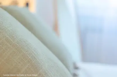 a close up of the edge of a couch at La Casa di Azzurra in Rome