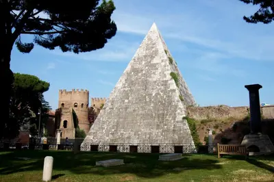 a pyramid in front of a castle at La Casa di Azzurra in Rome