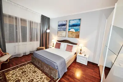 a bedroom with a large bed in a room at Vatican luxury - private parking free - meospiti luxury in Rome