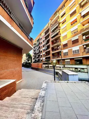 an empty street in front of a building at Maison Ammiragli Vatican Rooms in Rome