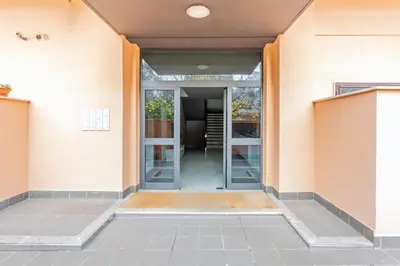 an entrance to a building with a glass door at 15 Minuti a Piedi dai Musei Vaticani in Rome