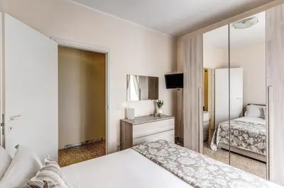 a hotel room with a bed and a mirror at Rdd in Rome
