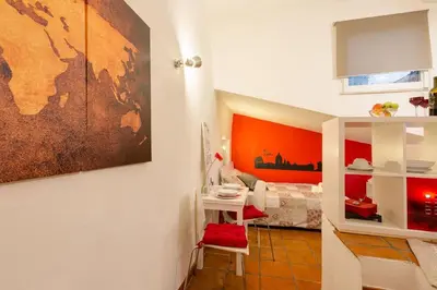 a room with a map of the world on the wall at Dimora Pastini in Rome
