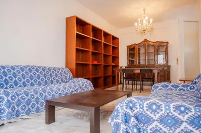 a living room with a couch and a table at Fleming in Rome