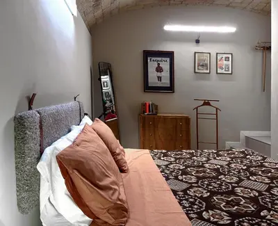 a bedroom with a bed in a room at The shelter in Rome