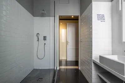 a bathroom with a shower and a sink at Trastevere comfort 2 camere 2 bagni in Rome