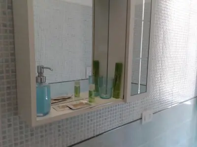 a bathroom counter with a sink and a mirror at Alenic in Rome
