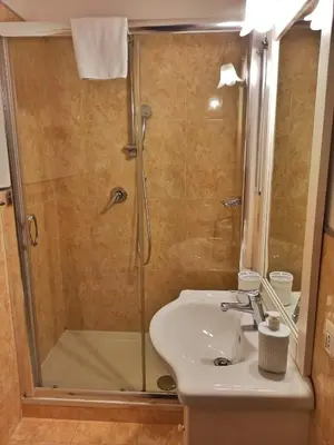 a bathroom with a shower and a sink at Domina Popolo in Rome