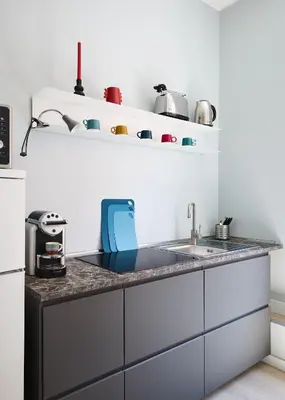a kitchen with a sink and a counter top at Domus Modista (Musei Vaticani) in Rome