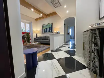 a bathroom with a sink and a toilet at Trevi Fountain Luxury Flat in Rome