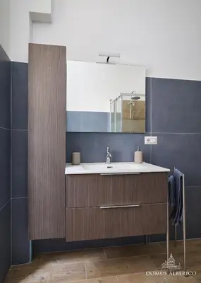 a bathroom with a sink and a mirror at Domus Alberico 11 (Vaticano) in Rome