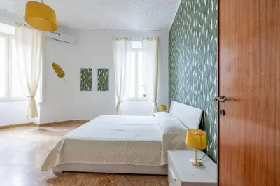 a bedroom with a bed and a window at San Lorenzo Residence two in Rome