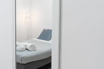 a room with a bed with towels on it at vatican apartment gianicolo in Rome