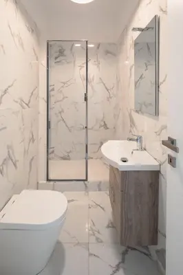 a bathroom with a toilet and a sink and a shower at Claudio Vaticano Home in Rome