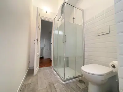 a bathroom with a shower and a toilet at Montezebio Boutique Apartment in Rome