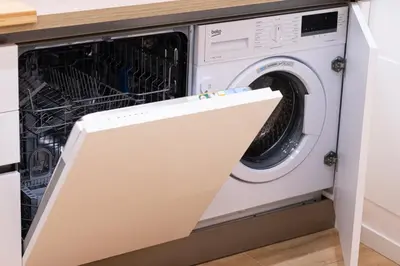 a washer and dryer in a kitchen at Domus Vatican Holiday in Rome