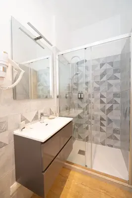 a bathroom with a shower and a sink at Domus Vatican Holiday in Rome