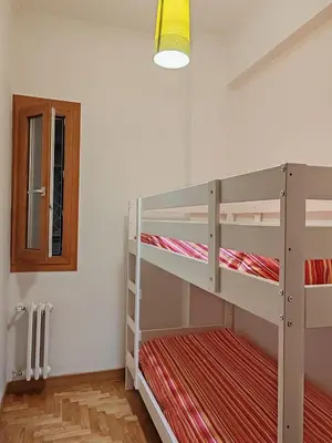 a bedroom with bunk beds in a room at Domus Cornelia in Rome