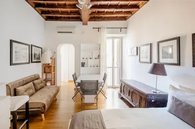 a living room with a couch and a table at Domus Paolina in Rome