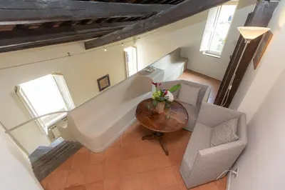 an overhead view of a living room with a table and chairs at Amazing Fontana di Trevi in Rome
