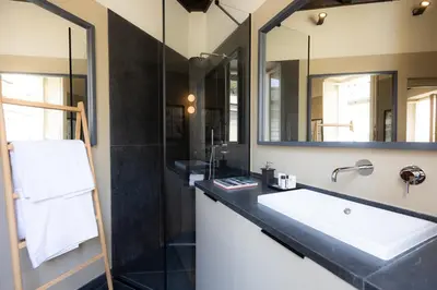 a bathroom with a sink and a mirror at Amazing Fontana di Trevi in Rome