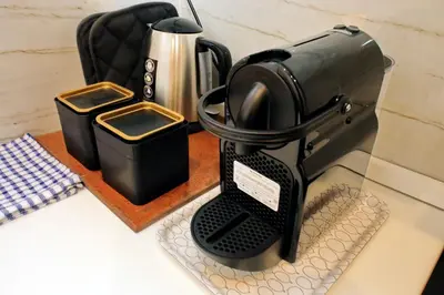 a coffee maker sitting on top of a counter at Trevi Feddy's Apartment in Rome
