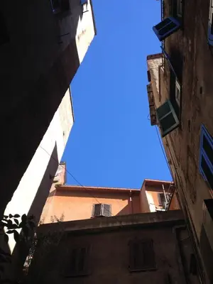 a view of the sky from an alley between two buildings at Casina Roma, 2 min to Piazza Navona in Rome