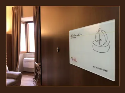 a picture of a drawing on a wall in a room at All'antico molino in Rome
