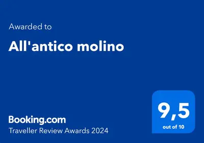a blue rectangle with the words all articulo mula at All'antico molino in Rome