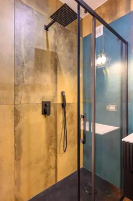a shower with a glass door in a bathroom at Riad Campo de' Fiori in Rome