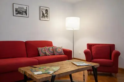 a bedroom with a bed with towels on it at Peaceful apartment in piazza Venezia's alleys in Rome