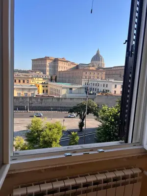 a view of a city from a window at IMPERIUM INN in Rome