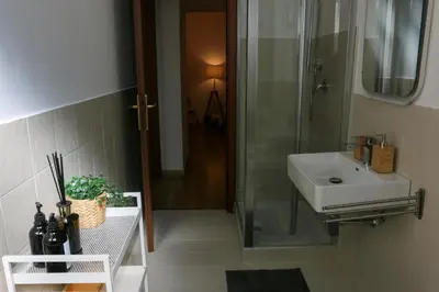 a bathroom with a sink and a shower at Policlinico Apartment in Rome