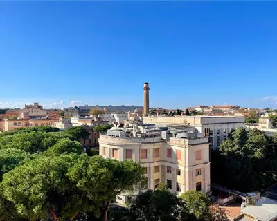 a view of a city with a tall building at Policlinico Apartment in Rome
