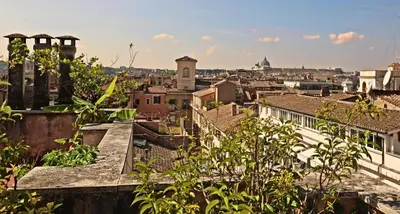 a view of a city from the roof of a building at Romerooms Condotti in Rome