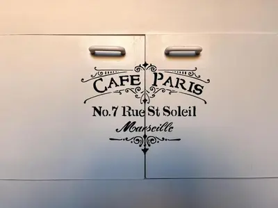 a white box with a sign that says cafe paris no ridge st social at [Termini Treasure] - Elegant retreat in Rome