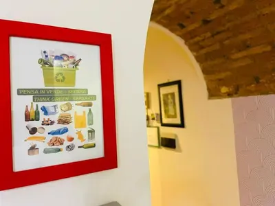 a picture hanging on a wall in a room at La Cornice Apartment in Rome