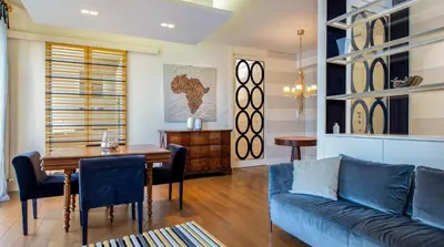 a living room with a couch and a table at [ROMAN JEWEL] Elegant apartment near the center in Rome