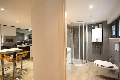 a kitchen with a stove and a counter top at Ponte Milvio Lovely Studio in Rome