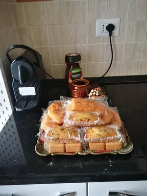 a counter top with sandwiches and peanut butter and jelly at stazione trastevere\u516c\u5bd3 in Rome