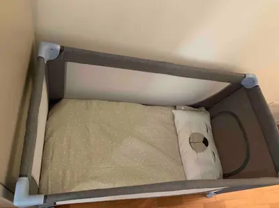 a box with a bed in a room at MONTI44 Boutique Apartment in Rome