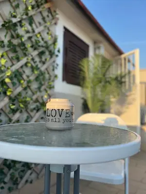 a coffee cup sitting on top of a table at Loft Panoramico San Giovanni in Rome